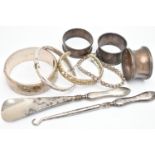 SILVER BANGLES, NAPKIN RINGS AND OTHER ITEMS, to include a silver wide hinged floral bangle, push