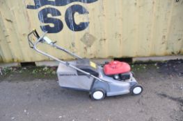 A HONDA HRB425c self propelled petrol lawn mower with grass box (engine pulls freely but hasn't