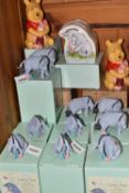 A GROUP OF BOXED ENESCO WINNIE THE POOH FIGURES AND MONEY BANKS, comprising two 'Best of Friends'