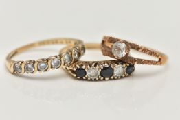 THREE GEM SET RINGS, the first a 9ct gold colourless topaz single stone ring, textured bifurcated