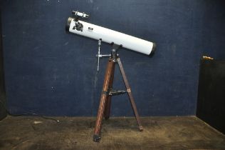 AN ASTRO ASTRONOMICAL REFLECTOR TELESCOPE, marked D90mm F640mm, with front cap and a wooden tripod