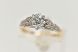 A SINGLE STONE DIAMOND RING, the brilliant cut diamond within an eight claw setting, to the leaf