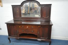 A 20TH CENTURY MAHOGANY MIRRORBACK SIDEBOARD, the arched raised back with a bevelled mirror plate,