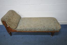 A LATE 19TH/EARLY 20TH CENTURY PITCH PINE CHAISE LOUNGE, with foliate upholstery, length 175cm x