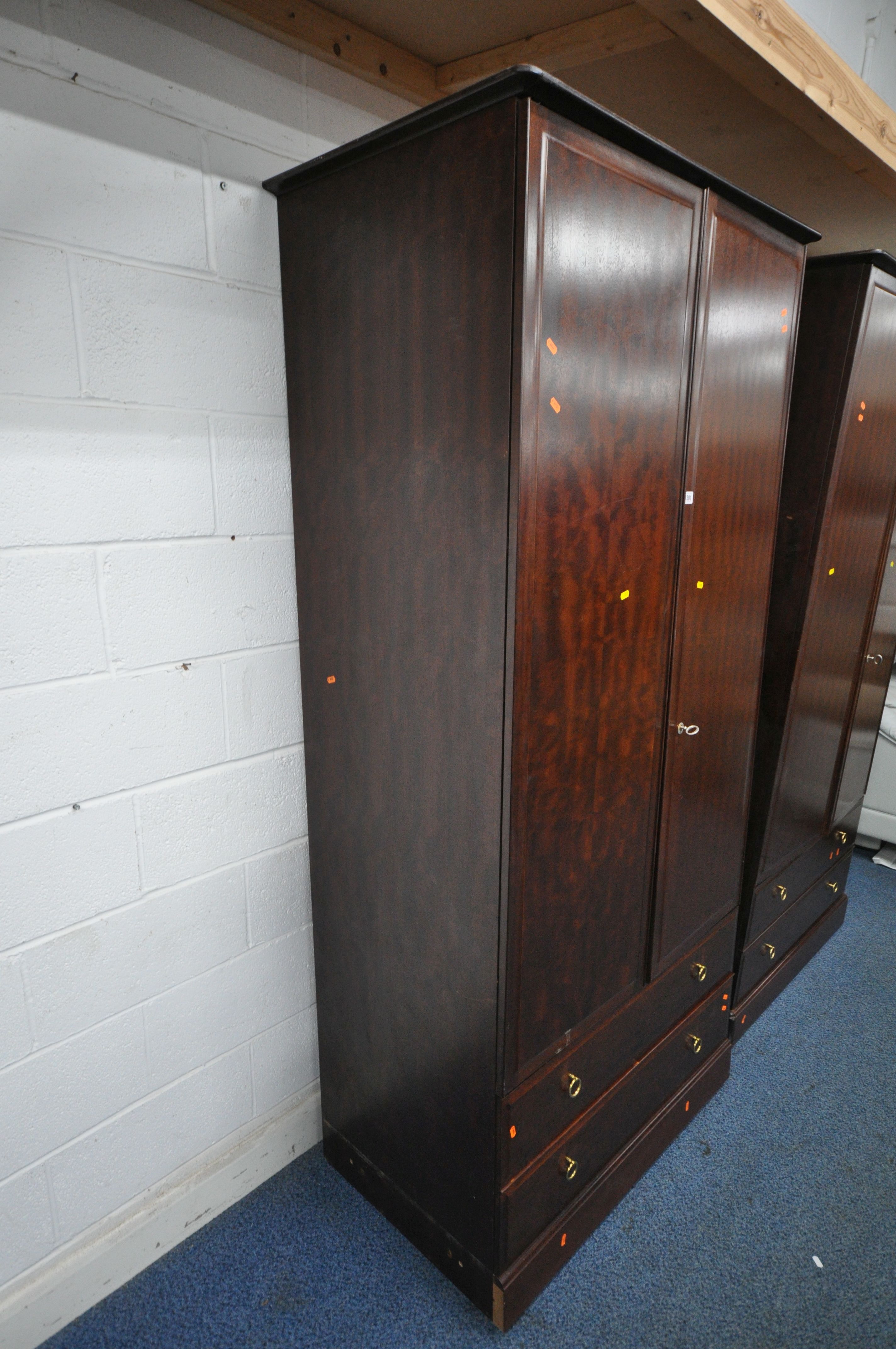 A PAIR OF TALL STAG MINSTREL DOUBLE DOOR WARDROBES, each with two drawers, width 104cm x depth - Image 2 of 4