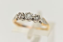 A THREE STONE DIAMOND RING, an old cut diamond with two rose cut diamonds, set in a white metal