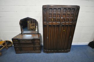 A 20TH CENTURY OAK TWO PIECE BEDROOM SUITE, comprising a double door wardrobe, width 123cm x depth