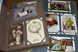 TWO ALBUMS OF POSTCARDS containing approximately 490 mainly sentimental greeting type examples