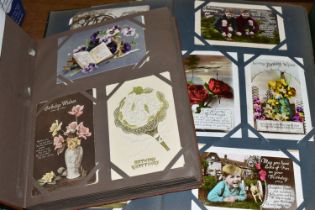 TWO ALBUMS OF POSTCARDS containing approximately 490 mainly sentimental greeting type examples