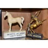 BREWERIANA: TWO ADVERTISING DISPLAY FIGURES, comprising a plastic Remy Martin figure of a golden