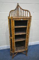 A BAMBOO CORNER CUPBOARD, with raised gallery back, oriental chinoiserie detail, the single door