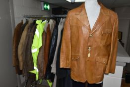 A LARGE QUANTITY OF VINTAGE GENTLEMEN'S OVERCOATS AND JACKETS, to include a tan coloured 1970's
