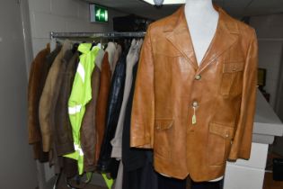 A LARGE QUANTITY OF VINTAGE GENTLEMEN'S OVERCOATS AND JACKETS, to include a tan coloured 1970's