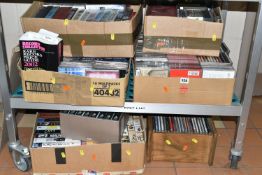 SIX BOXES OF CDS AND VIDEOS, to include thirty new and unused TDK TV 180 VHS cassettes, a boxed