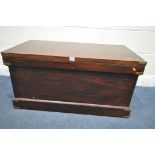 A STAINED PINE CAMPAIGN BLANKET BOX, with a hinged lid, twin brass handles and banding, width 95cm x