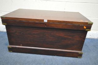 A STAINED PINE CAMPAIGN BLANKET BOX, with a hinged lid, twin brass handles and banding, width 95cm x