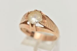 A 9CT GOLD SINGLE STONE GENTS RING, a round cut colourless topaz, prong set in yellow gold,