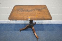 A VICTORIAN FLAME MAHOGANY TILT TOP TRIPOD TABLE, with a turned support, on three shaped legs and