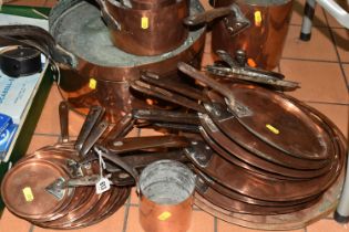 A LARGE QUANTITY OF COPPER SAUCEPANS, POTS AND LIDS, comprising a large pan, diameter 33cm, a set of