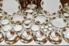 A ONE HUNDRED AND TWENTY NINE PIECE ROYAL ALBERT 'OLD COUNTRY ROSES' DINNER SERVICE AND GIFT