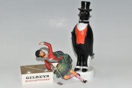 BREWERIANA: TWO WHISKY ADVERTISING FIGURES, comprising an 'Old Crow' (Kentucky Straight Bourbon