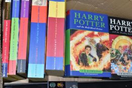 HARRY POTTER, A Collection of paperback and hardback volumes of each book in the series (7) with two