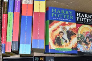 HARRY POTTER, A Collection of paperback and hardback volumes of each book in the series (7) with two