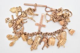 A 9CT GOLD CHARM BRACELET, curb link bracelet, each linked stamped 9.375, fitted with a T-bar