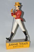 BREWERIANA: A RESIN JOHNNY WALKER WHISKY ADVERTISING FIGURE, with top hat, monocle and walking cane,