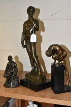 A BRONZE FIGURE AND TWO OTHER FIGURES, comprising a bronze figure of David after Michelangelo, on