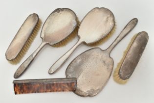 A SIX PIECE SILVER DRESSING TABLE SET, comprising of two hair brushes, a comb, two clothes brushes