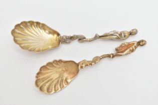 TWO CONDIMENT SPOONS, both with a gilt shell shape bowls, fitted with fish and a robed man to the