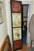 A LARGE PUB ADVERTISING BOARD, comprising four metal advertising panels in a wooden frame with