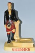 A GLENFIDDICH SCOTCH WHISKY ADVERTISING FIGURE, the chalkware figure in the form of a Scotsman