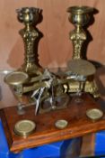 A SET OF BRASS POSTAL SCALES, comprising scales set on an oak plinth with 4oz, 2oz and 1.5 oz