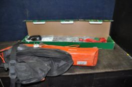 A GARDENLINE ELECTRIC POLE HEDGE TRIMMER (still packaged and new) and a Flymo garden vac (untested)