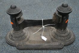 A VICTORIAN CAST IRON BOOT SCRAPER, with two brush sections, and a dirt catcher, length 47cm x depth