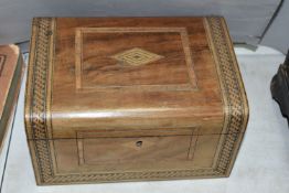 A VICTORIAN TUNBRIDGE WARE SEWING BOX, having red silk interior, complete with key, approximate