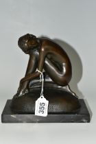 A BRONZE FIGURE OF AN EROTIC YOUNG WOMAN, created by Portuguese artist Milo, 'Dreaming', fixed to