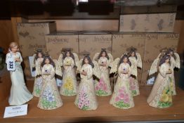 A GROUP OF NINE BOXED JIM SHORE HEARTWOOD CREEK 'ANGELS', comprising two February 'Angels'