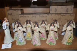 A GROUP OF NINE BOXED JIM SHORE HEARTWOOD CREEK 'ANGELS', comprising two February 'Angels'