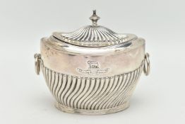 AN EDWARD VII SILVER SUGAR POT, of an oval form, stop reeded pattern, fitted with two ring