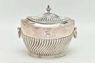 AN EDWARD VII SILVER SUGAR POT, of an oval form, stop reeded pattern, fitted with two ring