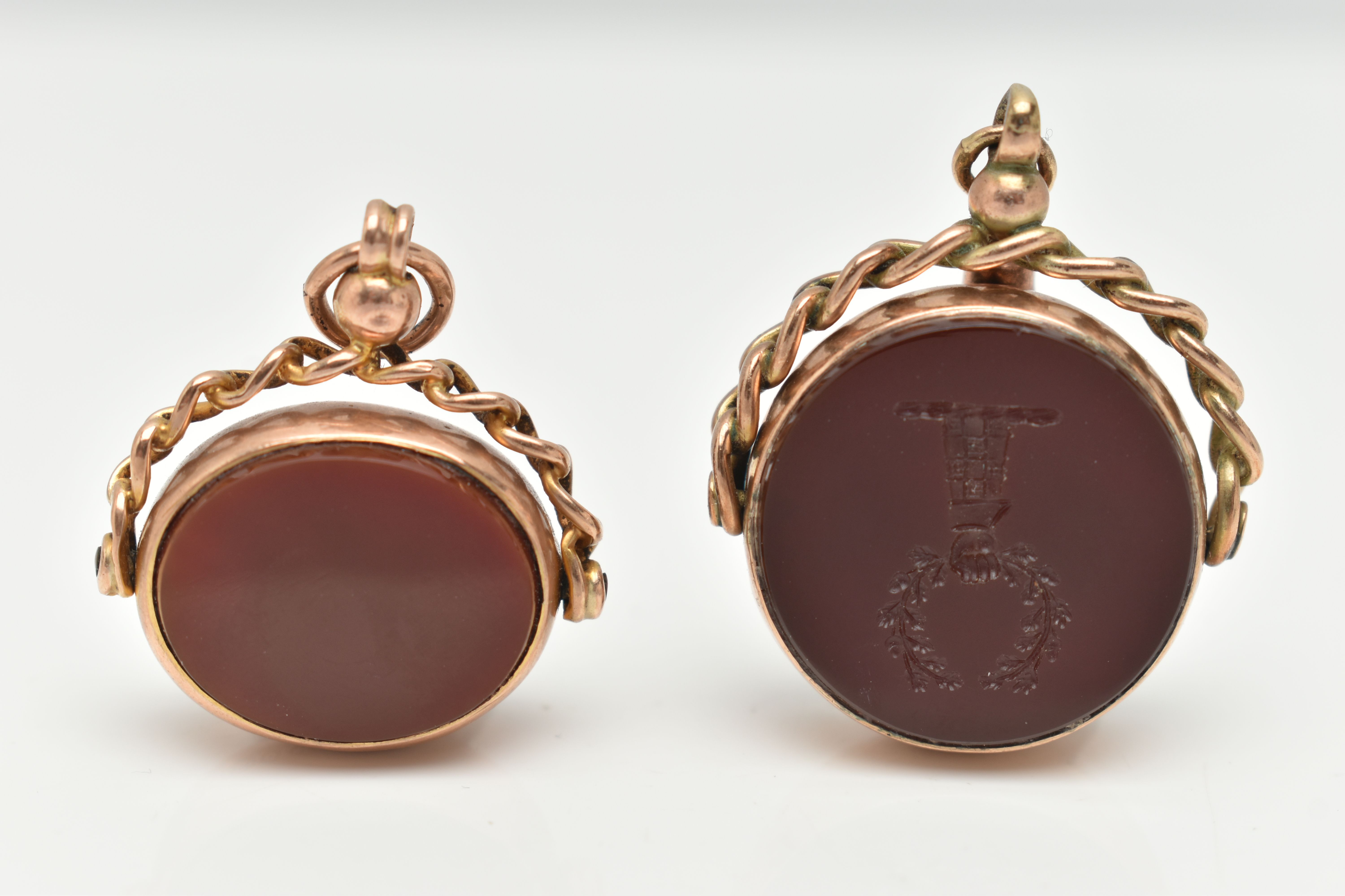 TWO 9CT GOLD SWIVEL FOBS, the first of a circular form set with carnelian with engraved intaglio and - Image 2 of 2