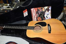 A CASED HOHNER GUITAR, model no MW 400N, in a Stagg guitar case with 'The Complete Guitar Player: