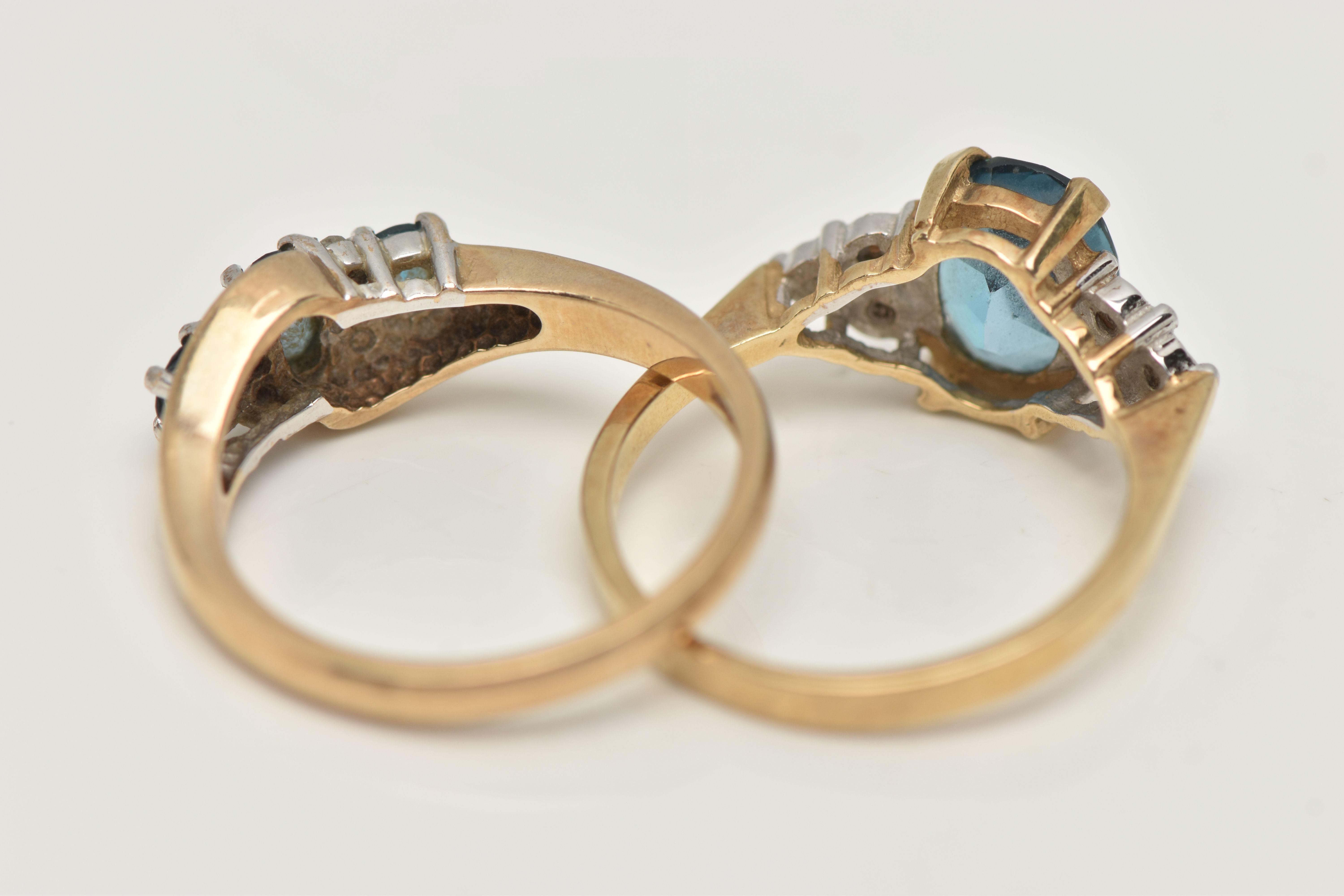 TWO 9CT GOLD GEM SET RINGS, the first an oval cut blue topaz, flanked with six single cut - Image 4 of 4