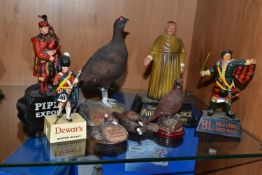 A COLLECTION OF SMALL WHISKY MASCOT FIGURES, comprising 'Piper Export', 'The Abbot's Choice Scotch