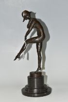 AFTER DEMETRE CHIPARUS, A BRONZE 'HARLEQUIN' FIGURE, modelled glancing over her shoulder, standing