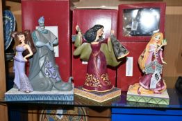 FOUR BOXED DISNEY TRADITIONS FIGURES, designed by Jim Shore, comprising Moxie and Menace no 6008070,