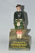 A GRANT'S STANDFAST SCOTCH WHISKY ADVERTISING FIGURE, the rubberoid figure in the form of a Scottish